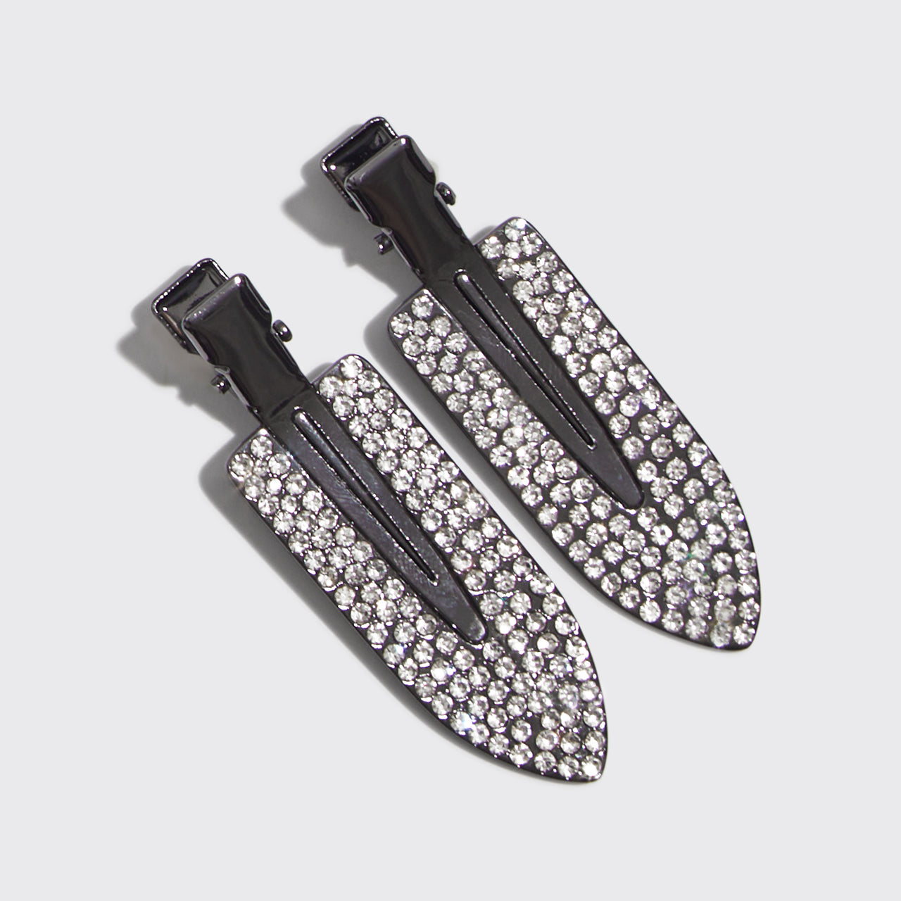 Set di 2 fermagli antipiega con strasss