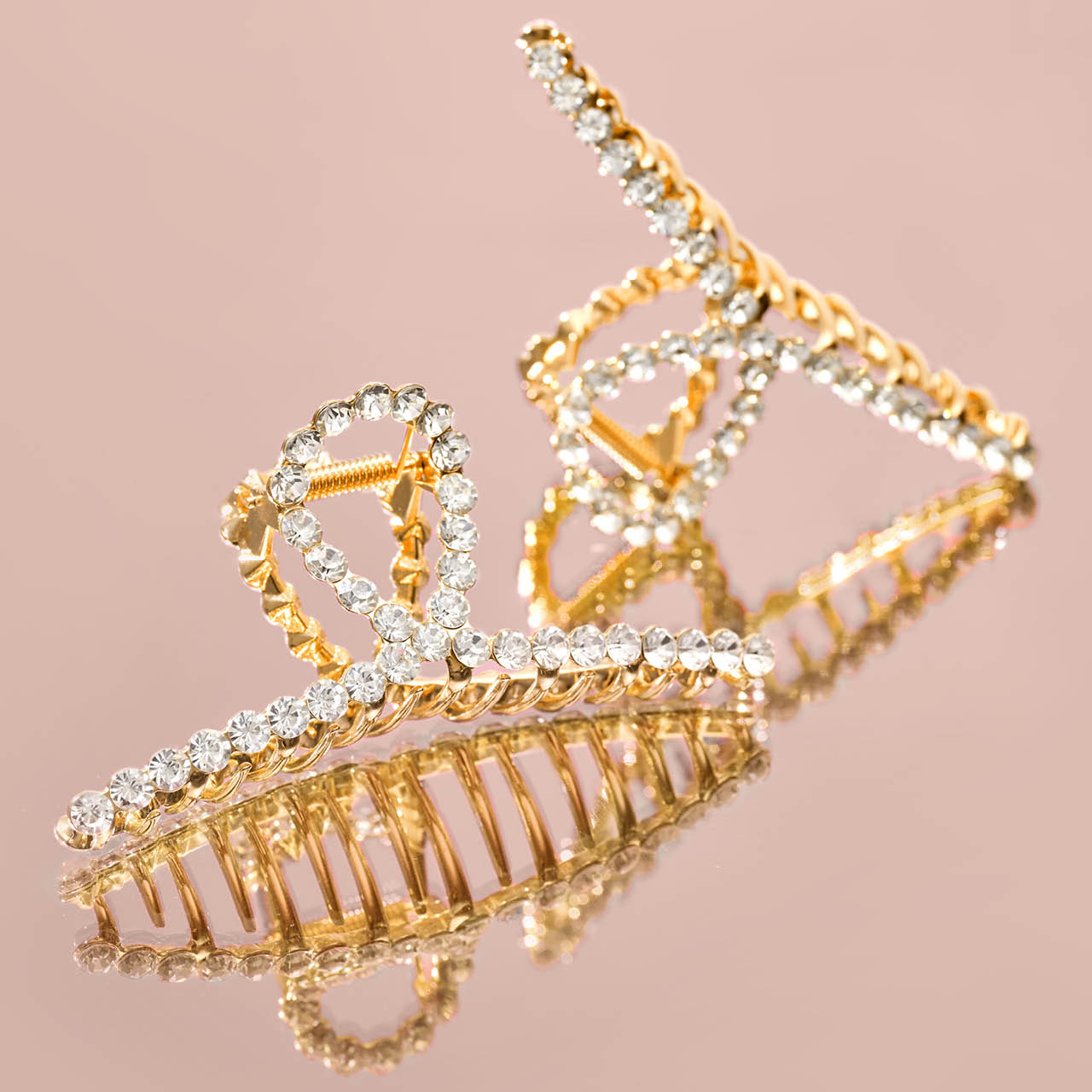 Clip à griffes en métal doré avec strass