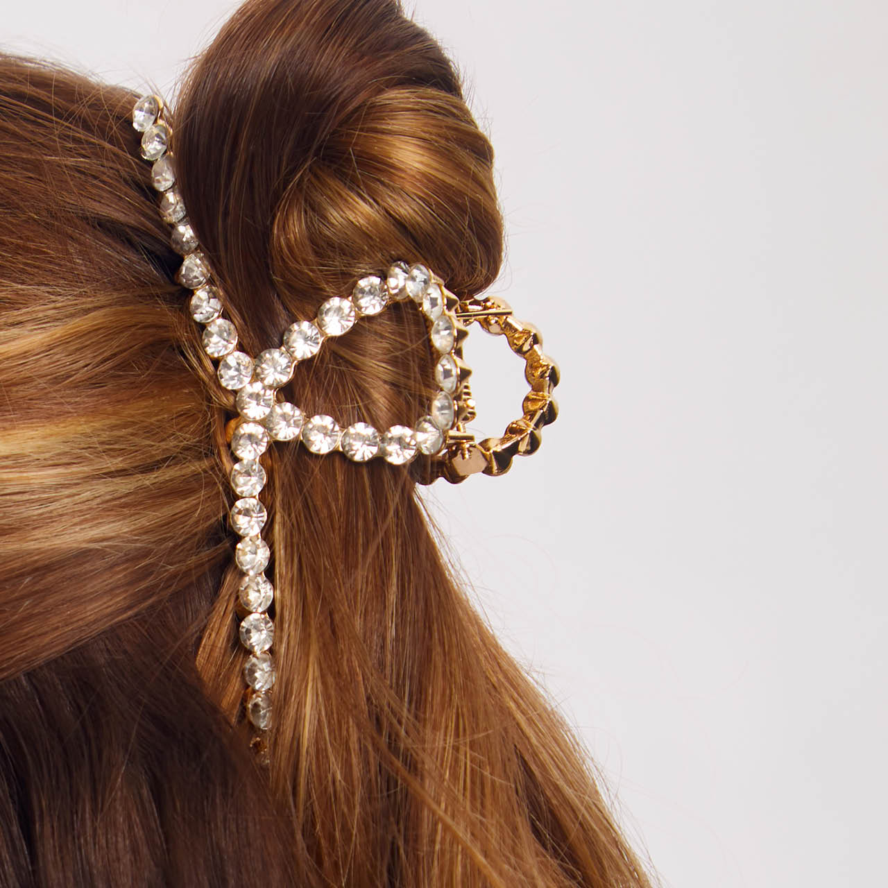 Clip à griffes en métal doré avec strass