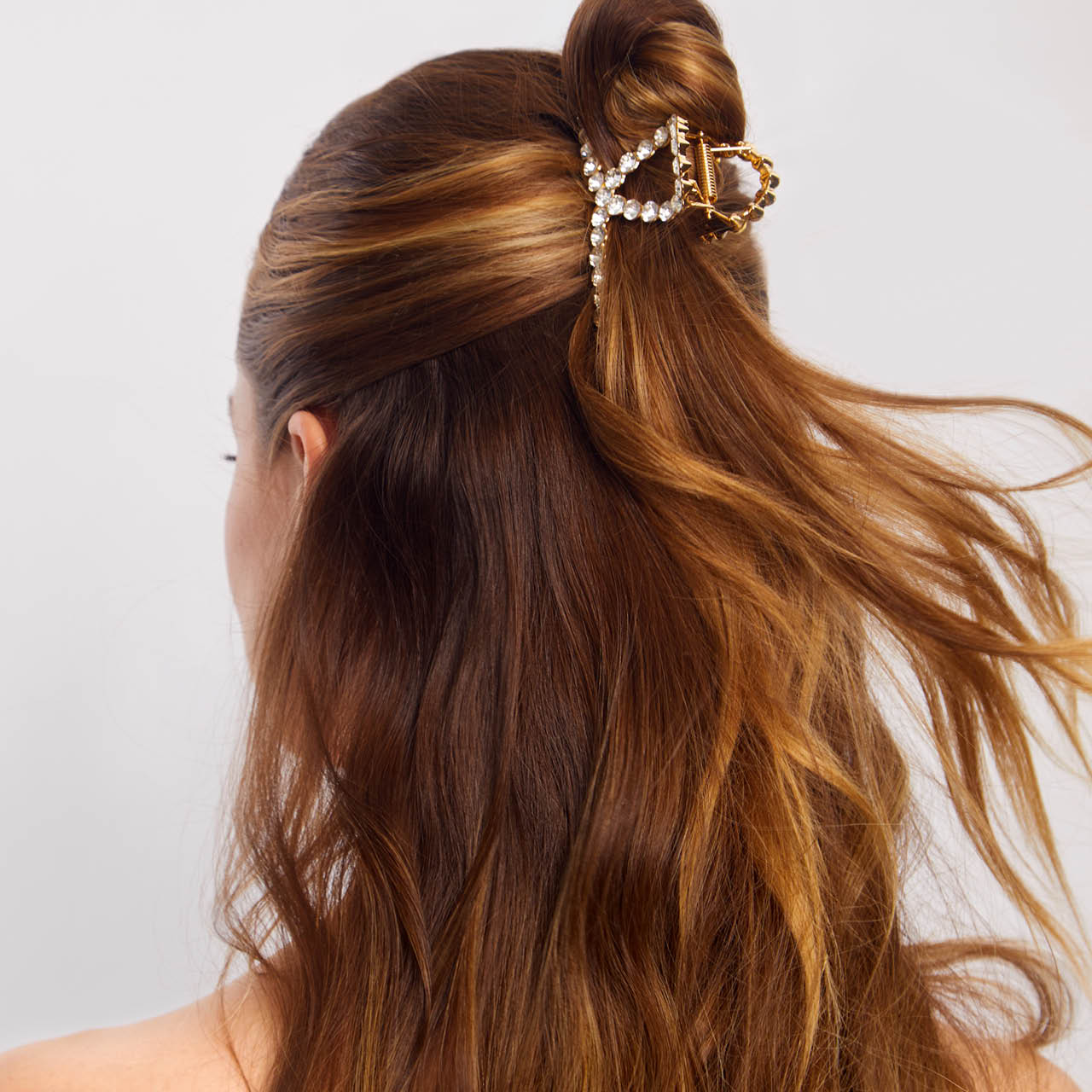Clip à griffes en métal doré avec strass