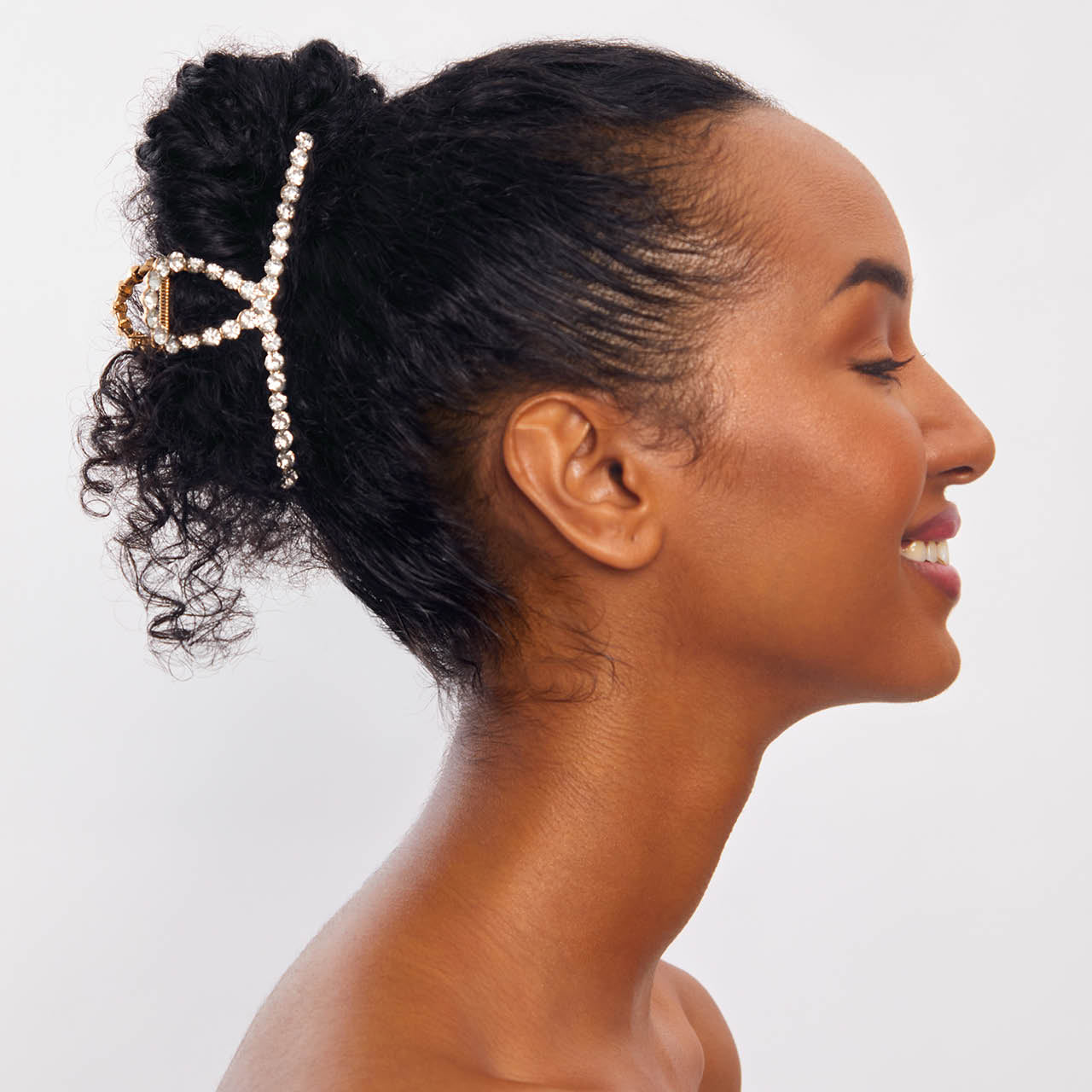 Clip à griffes en métal doré avec strass
