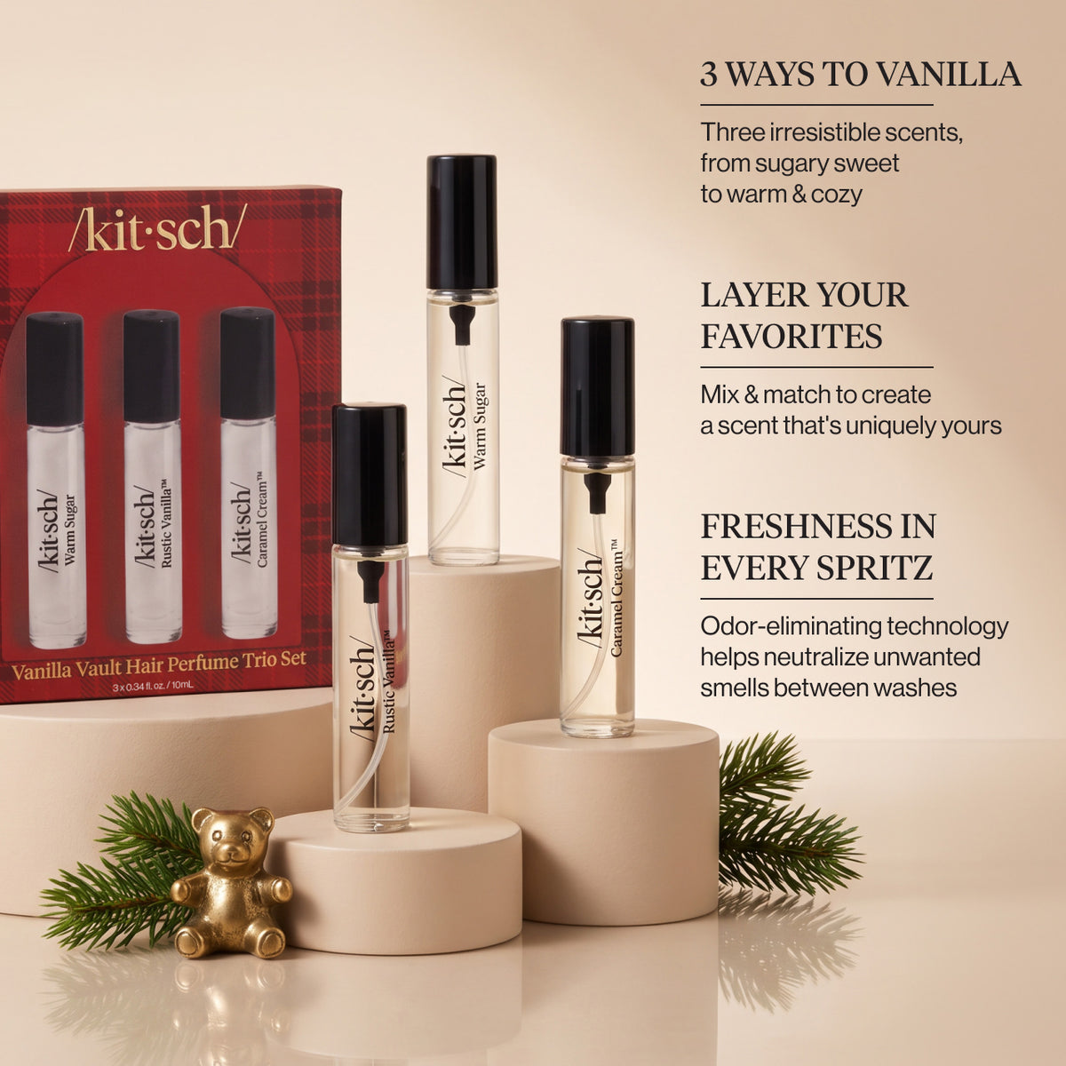 KITSCH Vanilla Vault Hair Perfume Trio Set — infographic of the red plaid gift box beside the three mini perfumes Warm Sugar, Rustic Vanilla and Caramel Cream on cream pedestals with a brass teddy bear and pine branches, with callouts 3 Ways to Vanilla, Layer Your Favorites and Freshness in Every Spritz — Patented technology helps neutralize unwanted odors at the source instead of simply masking them — wear it solo or layer with other Kitsch Hair Perfumes to create your own signature scent