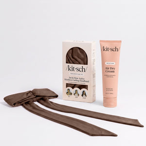 Kitsch Air Dry Cream and chocolate Set & Flow Active Heatless Curling Headband arranged with packaging.