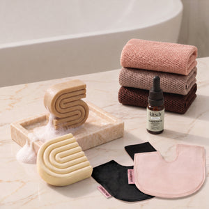 Coconut Oil: Kitsch Winter Welcome Kit with Coconut Oil shampoo and conditioner bars, Rosewood African Net Sponge, shampoo and conditioner bar bags, and Rosemary & Biotin Scalp & Hair Oil.
