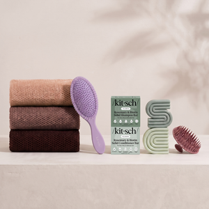 Kitsch Spring Welcome Kit Rosemary & Biotin shown as a full bundle with the Volumizing Rosemary & Biotin Shampoo and Conditioner Bars, Soft Violet Wet/Dry Brush, Terracotta Scalp Exfoliator and Rosewood African Net Sponge on a soft neutral background