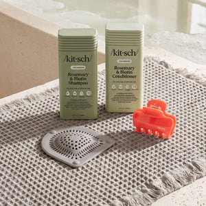 Summer Welcome Kit featuring Kitsch Rosemary & Biotin Volumizing Liquid Shampoo and Liquid Conditioner with free gifts including a Cherry Cloud Claw Clip (Medium), Quick-Dry Bath Mat, and Hair Catcher.