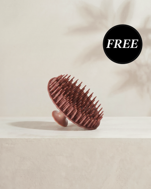 Kitsch Terracotta Scalp Exfoliator shown from two angles displaying the soft silicone bristles for scalp massage and gentle exfoliation